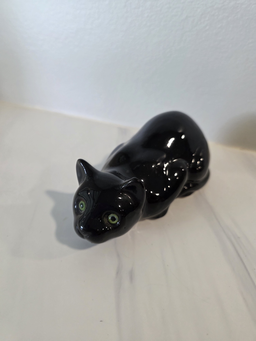 Vintage Black Ceramic Cat Figurine with Green Eyes